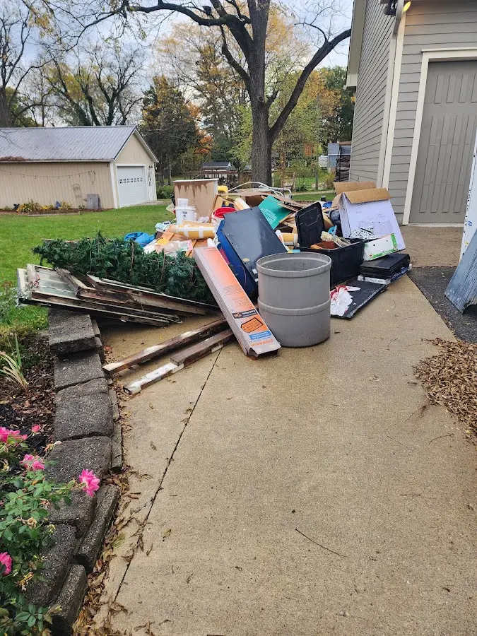 Dumpster being loaded with debris for Commercial Dumpster Rental in Lititz